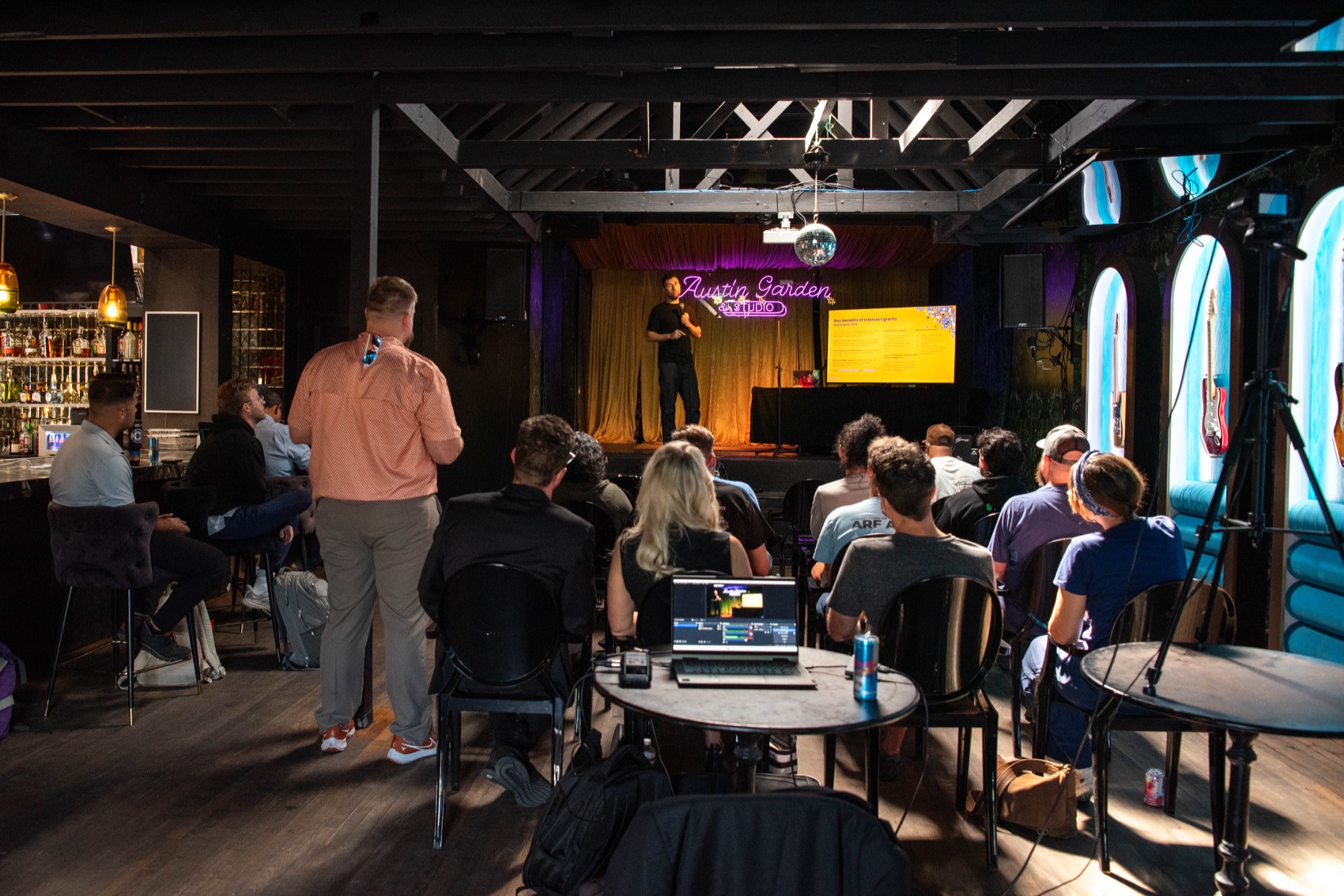 Intersect AMM Austin — stage, screen, and audience at Austin Garden & Studio