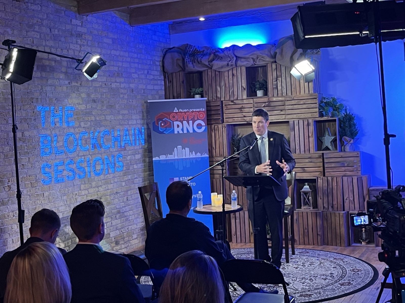 CryptoRNC 2024, Milwaukee — a speaker presenting on the produced stage