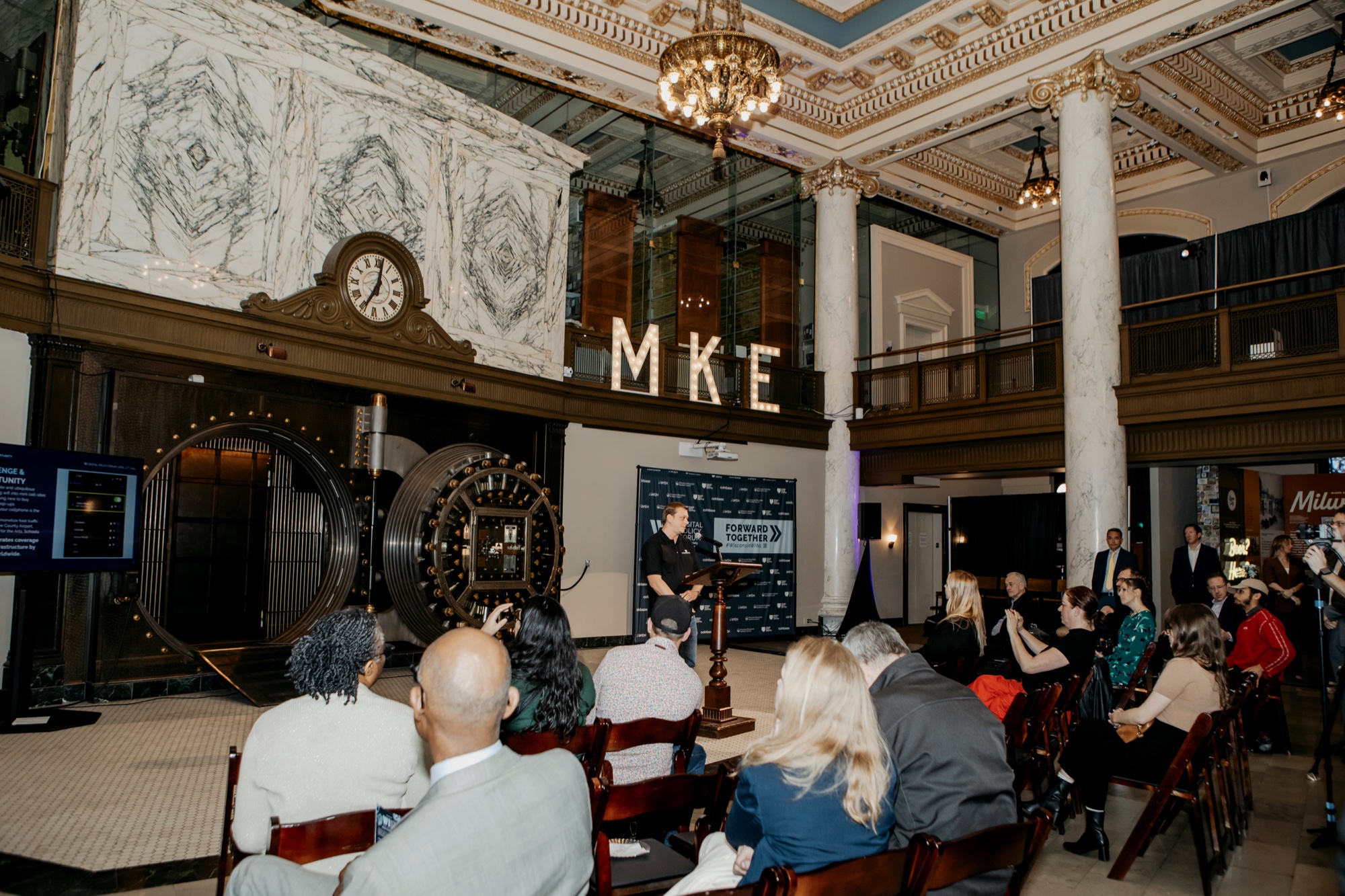 Wisconsin Digital Policy Forum — a packed audience in the historic hall beneath the ‘MKE’ marquee